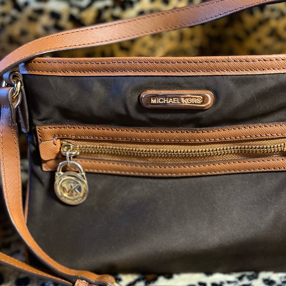 Perfect MK vinyl crossbody bag.